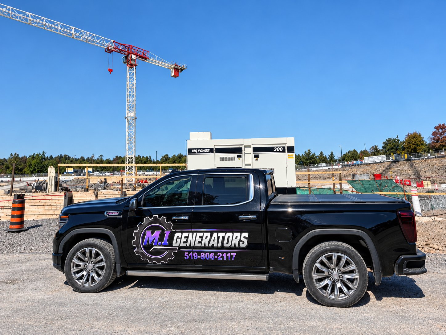 M.I Generators logo applied as a vehicle wrap on the company truck — side view